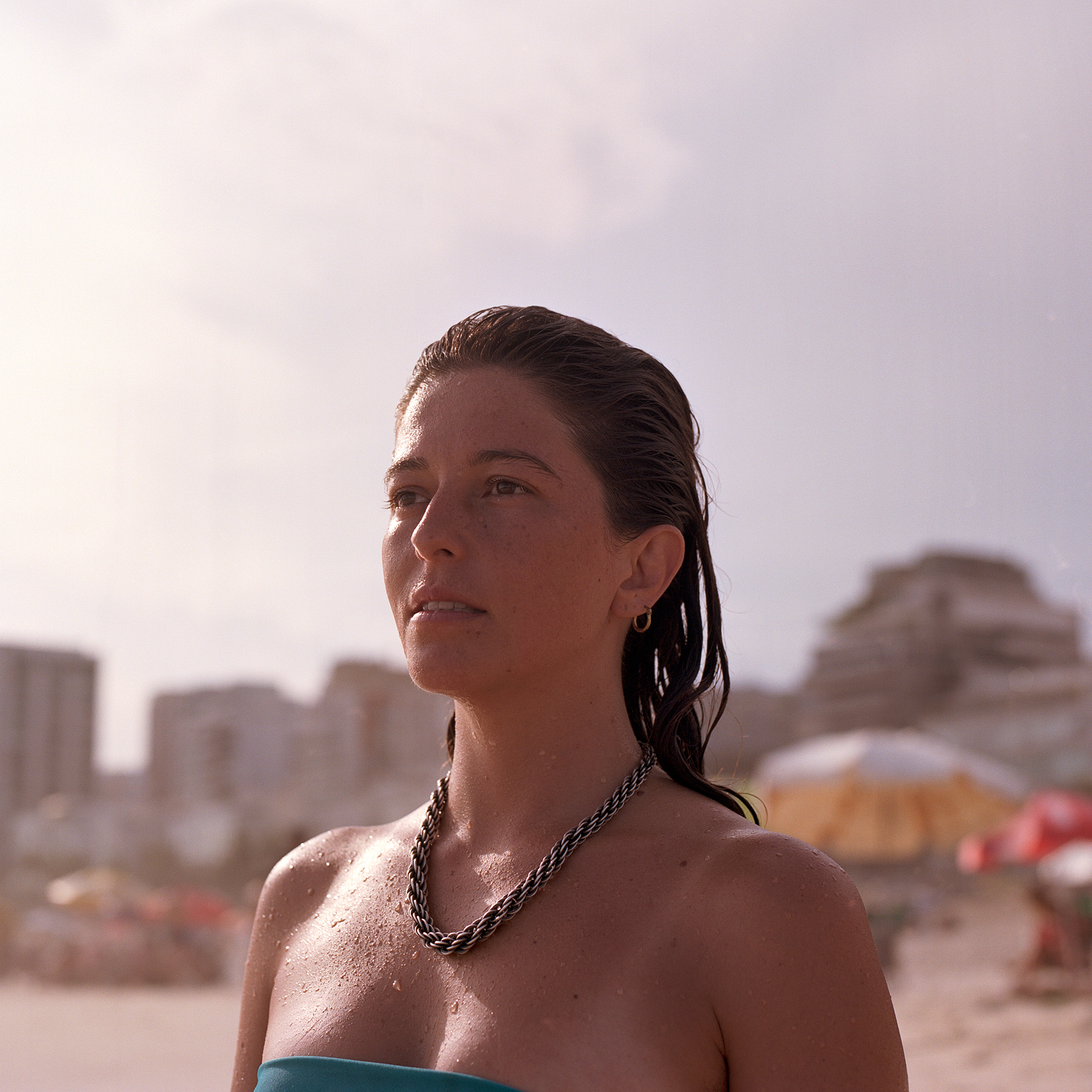 7 - Gaby looking at her Hometown after a swim - 54d89c87-0c3d-41f6-926a-ded5606aa329.jpg